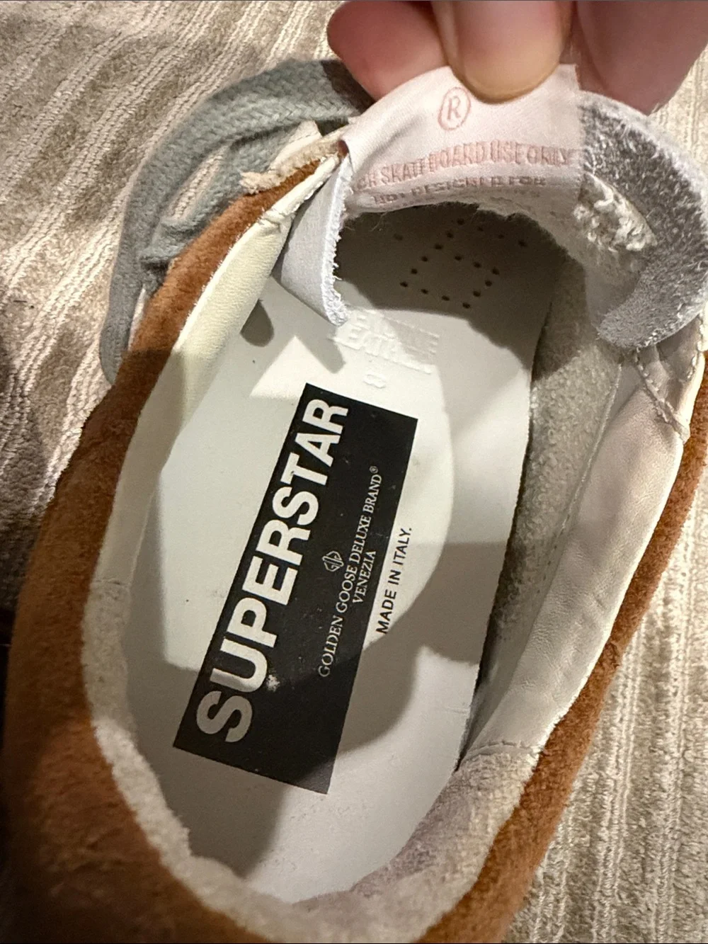 Golden Goose Women’s White Nubuck Low Top Super Star with Brown suede fringe.
